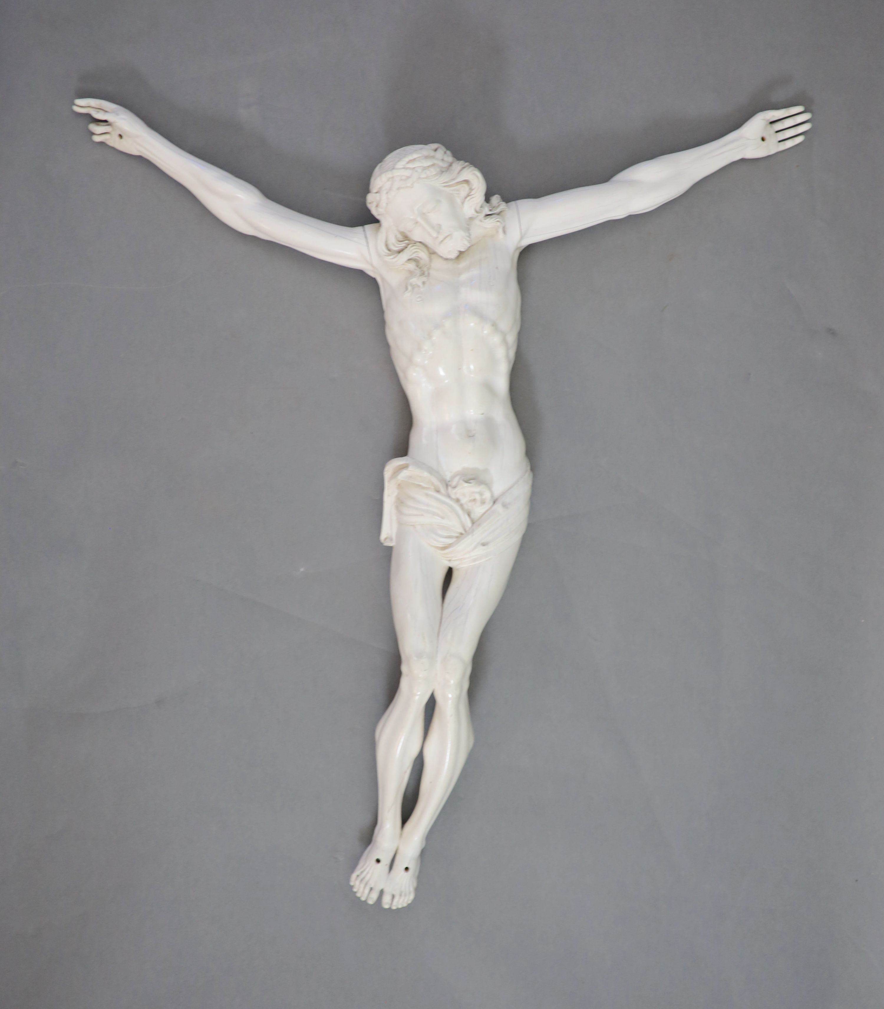 After Joseph Deutschmann (1717-1787) a very large German carved ivory Corpus Christi, 19th century 75cm wide, 75cm high.